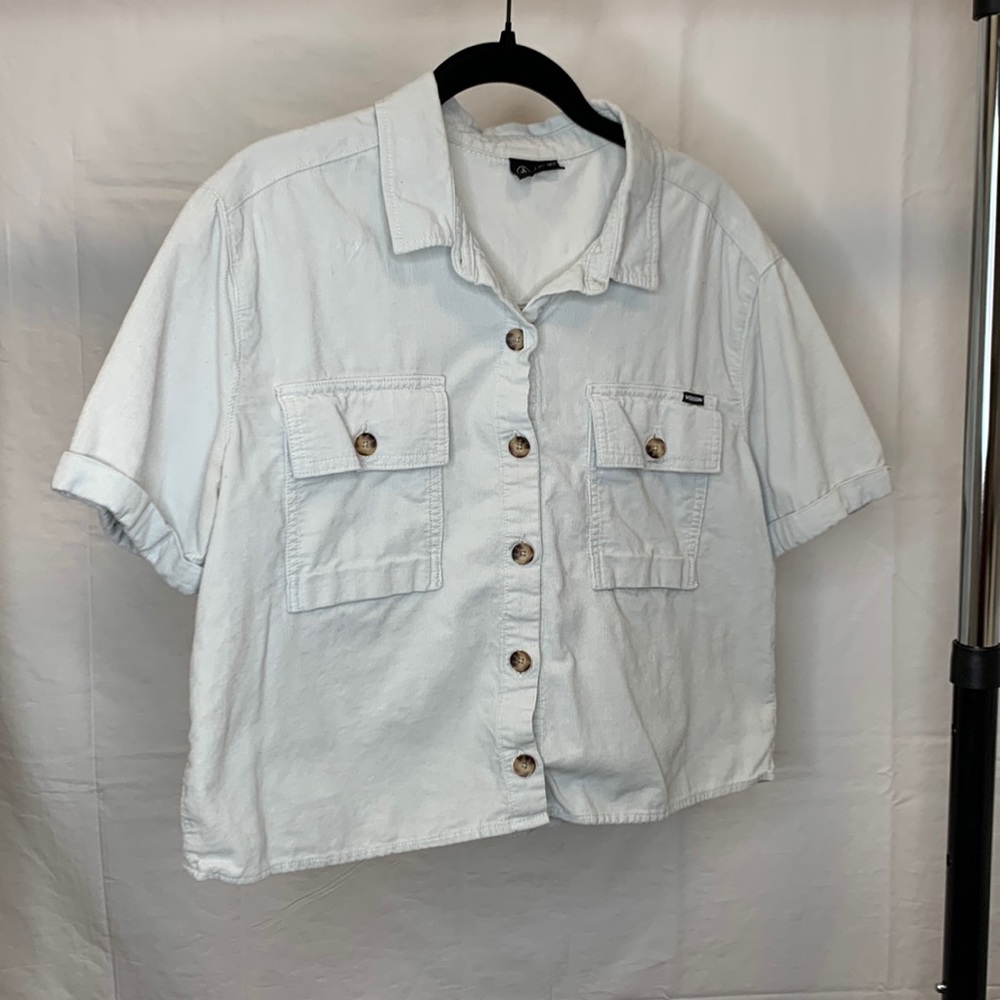 Light blue cropped button up shirt